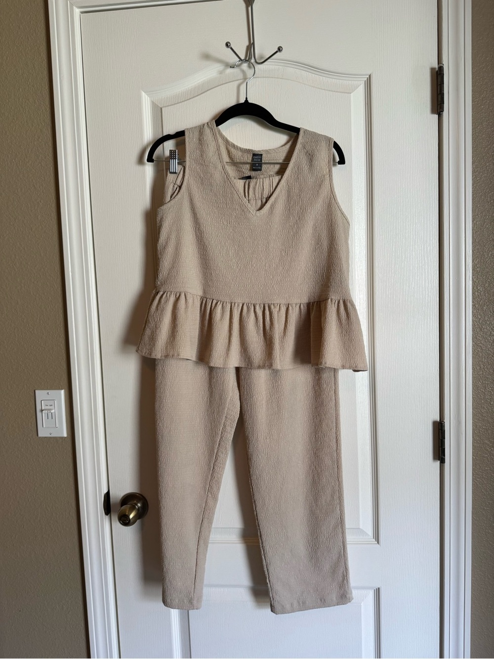 Sleeveless Peplum Jumpsuit in Beige